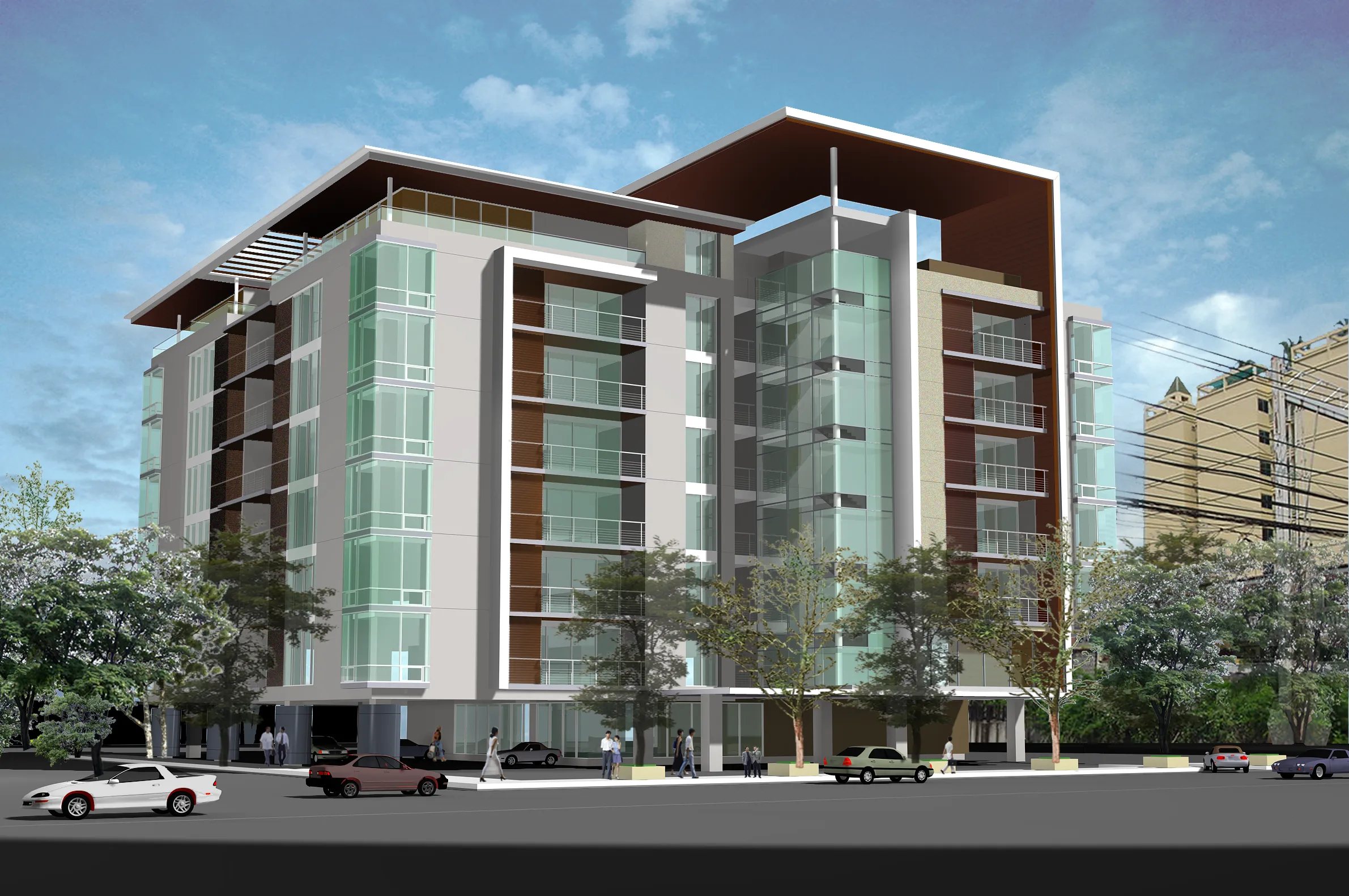 Modern multi-story building with glass facade, surrounded by trees and cars on a city street under a blue sky.