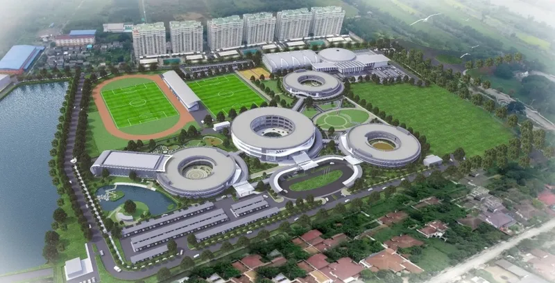ภาพถ่ายทางอากาศของวิทยาเขตขนาดใหญ่ที่ทันสมัย ​​ประกอบด้วยอาคารทรงกลม สนามกีฬา และพื้น