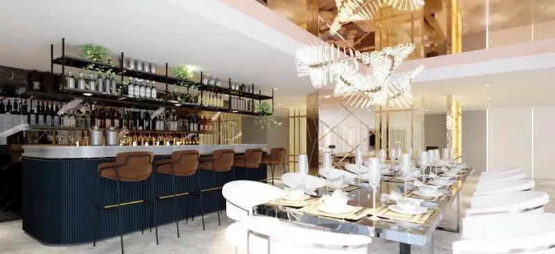 Modern restaurant interior with a bar, stylish chairs, elegant table settings, and artistic ceiling lights.