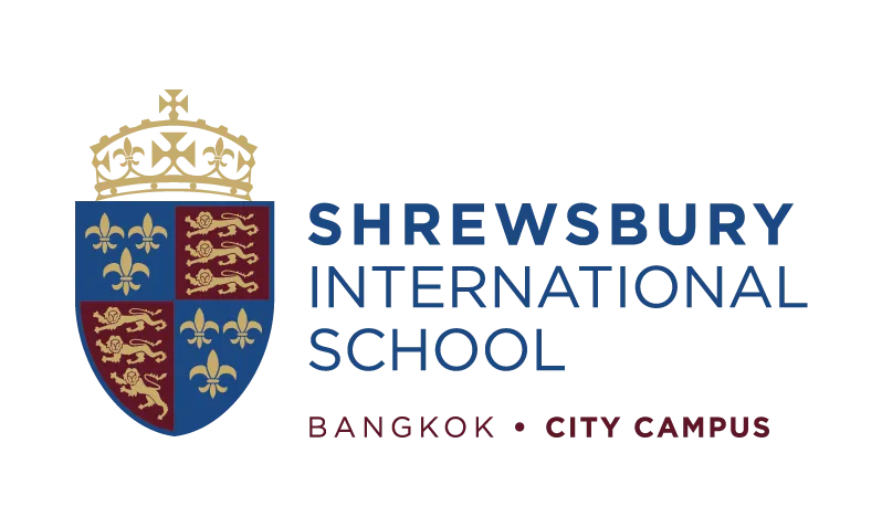Shrewsbury International School Bangkok City Campus logo with a crest featuring lions and fleurs-de-lis.