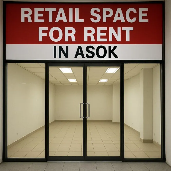 Empty retail space with glass doors, available for rent, located in Asok.