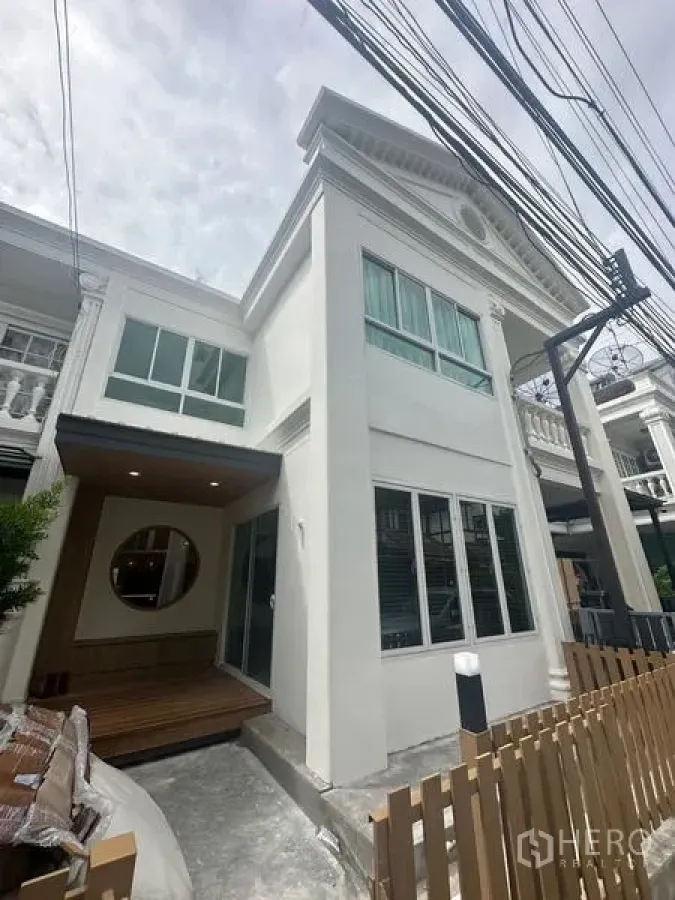 Home Office for rent in Khlong Toei, Bangkok - Another view of the townhouse exterior highlighting the classical cornice and tall windows.