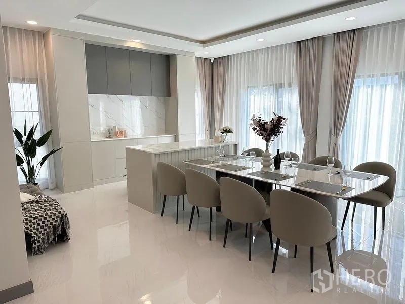 Detached House for rent or sale in Bang Phli, Samut Prakan - Light-filled dining and pantry with floor-to-ceiling curtains.