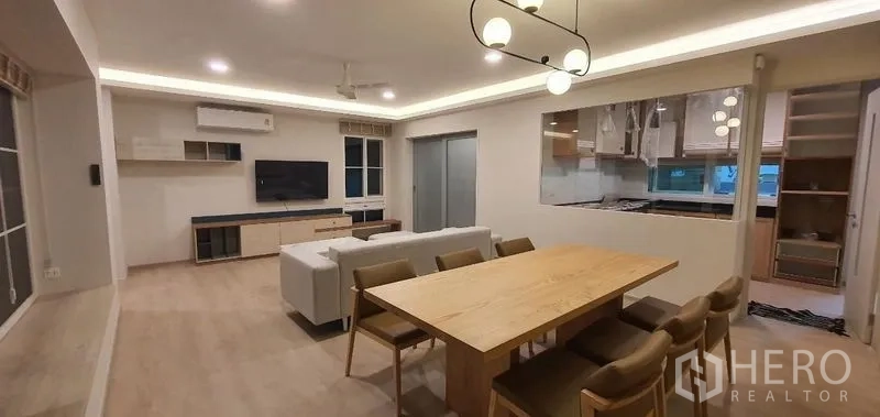 Detached House for rent - Dining area beside kitchen pass-through window with pendant lights.