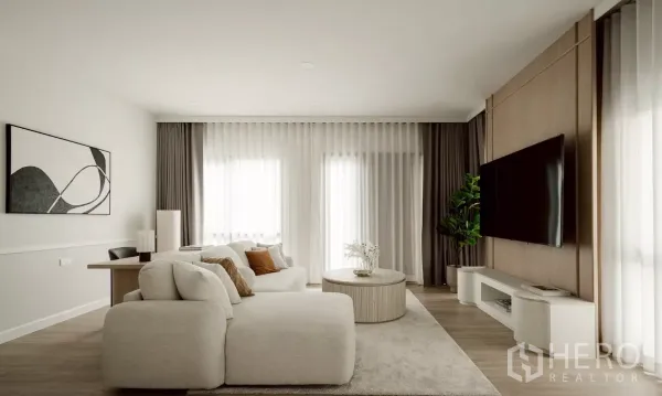 Detached House for rent in Bang Phli, Samut Prakan - Cozy lounge with sectional sofa, wall-mounted TV and large windows