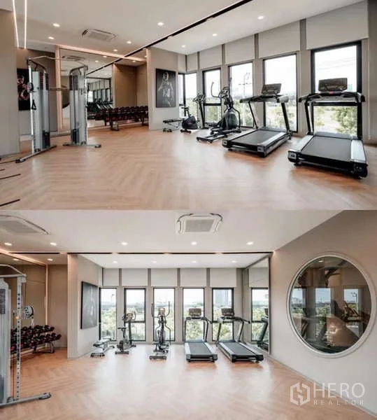 Detached House for rent in Bang Phli, Samut Prakan - Community fitness center with treadmills, weights and mirrored walls.