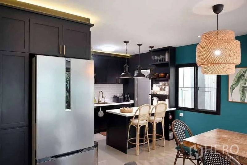 Detached House for sale in Bang Phli, Samut Prakan - Open-plan kitchen and dining with black cabinetry and island