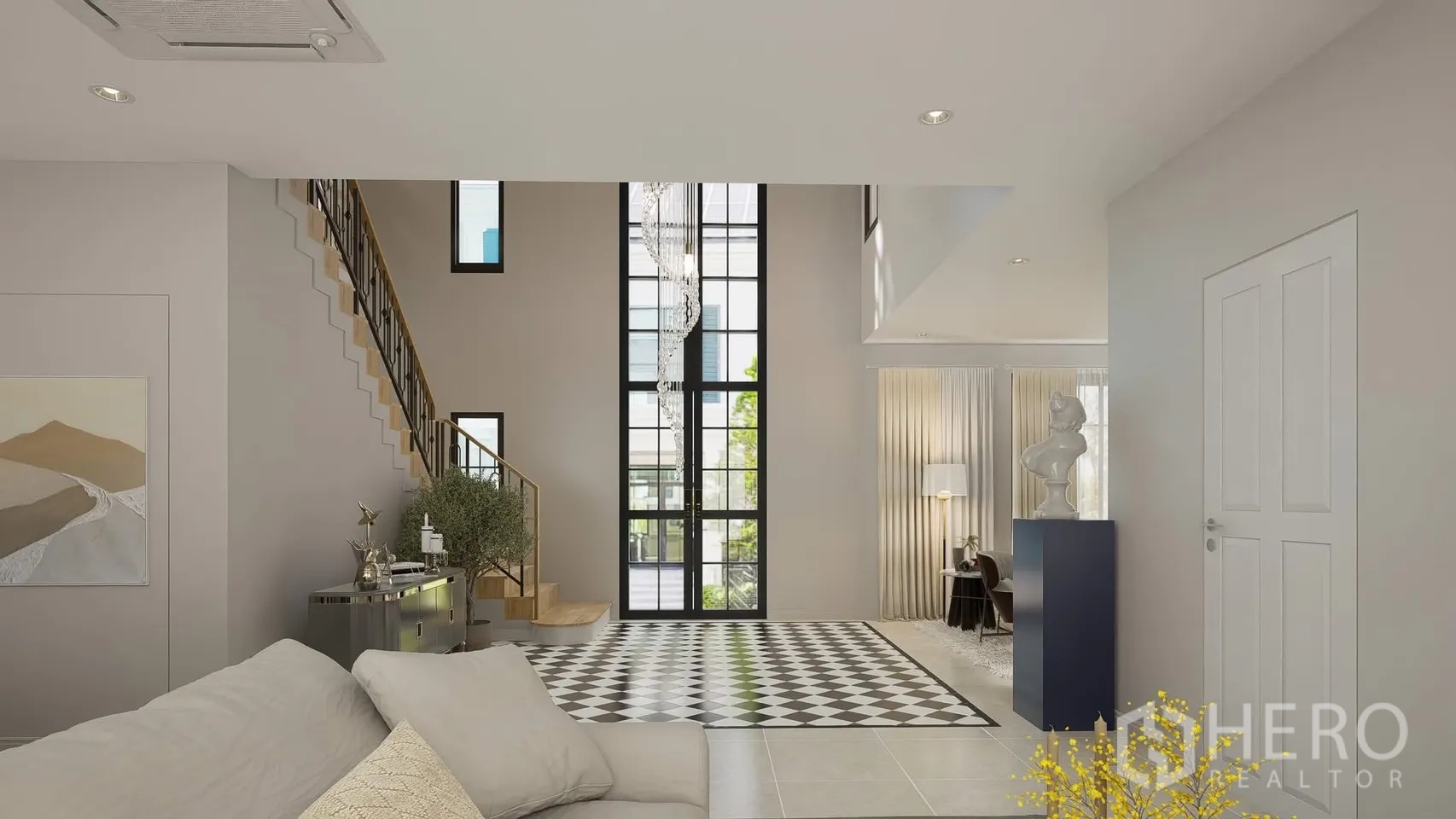 独立式住宅 出租在Bang Phli, Samut Prakan - 挑高客厅，落地窗与楼梯相连。