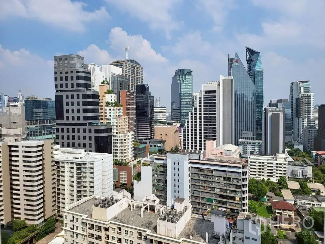 Condominium for rent in Khlong Toei, Bangkok - High-rise city skyline view from the condominium.