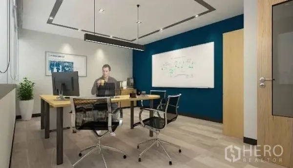 办公空间 出租在Chatuchak, Bangkok - 私密经理室，设办公桌、蓝色强调墙与白板。