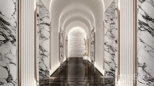 Apartment for rent in Khlong Toei, Bangkok - Grand marble corridor with arched ceiling, wall lighting and polished floors.