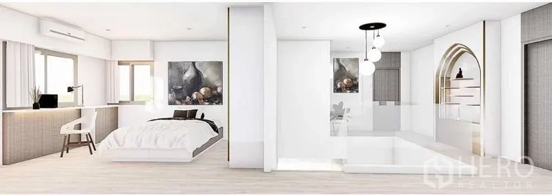 独立式住宅 出租在Lat Phrao, Bangkok - 宽敞主卧套房，配床、学习桌、拱形壁龛置物架与现代灯饰。