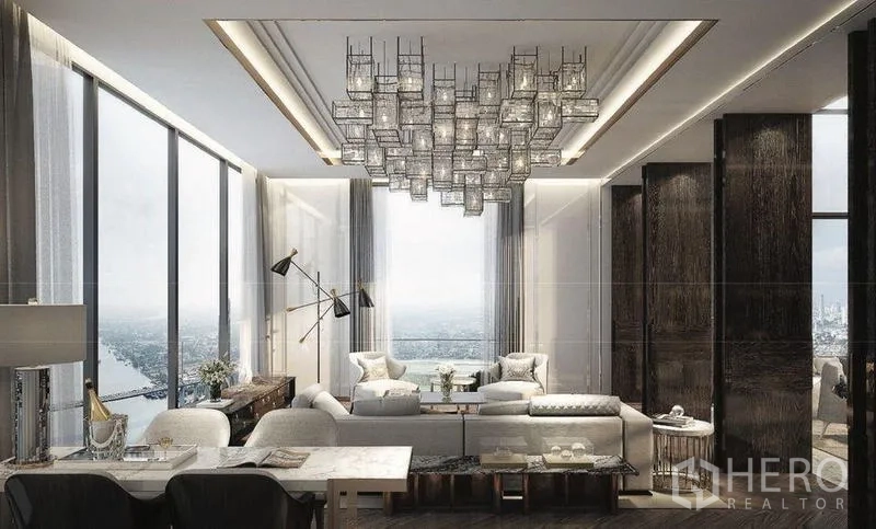 Condominium for sale in Bangkok - Contemporary living area with designer chandelier, river views and tall windows.
