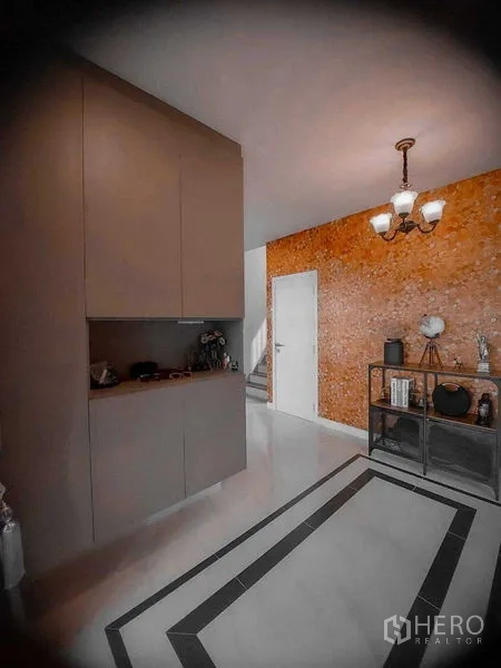 Detached House for rent in Bang Bo, Samut Prakan - Foyer view with feature wall, ceiling light and storage cabinet.