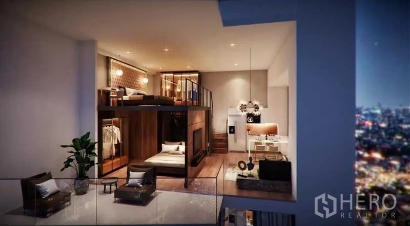 Condominium for sale in Huai Khwang, Bangkok - Double-height loft living area with mezzanine bedroom and city lights view.