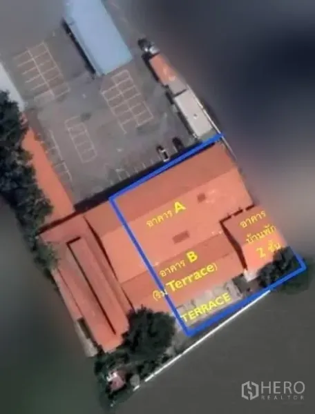 Retail Space for rent in Yan Nawa, Bangkok - Aerial view of low-rise commercial buildings outlined as zones A and B with a riverfront terrace beside the water.