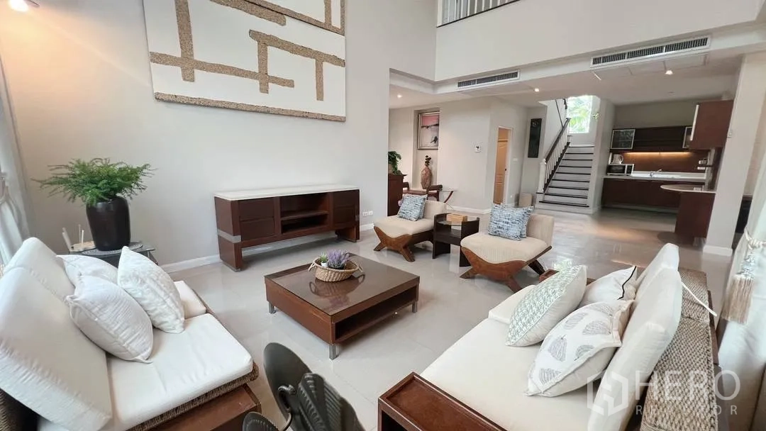 Detached House for rent in Lat Krabang, Bangkok - Dining room with floor-to-ceiling windows opening to the garden pergola.