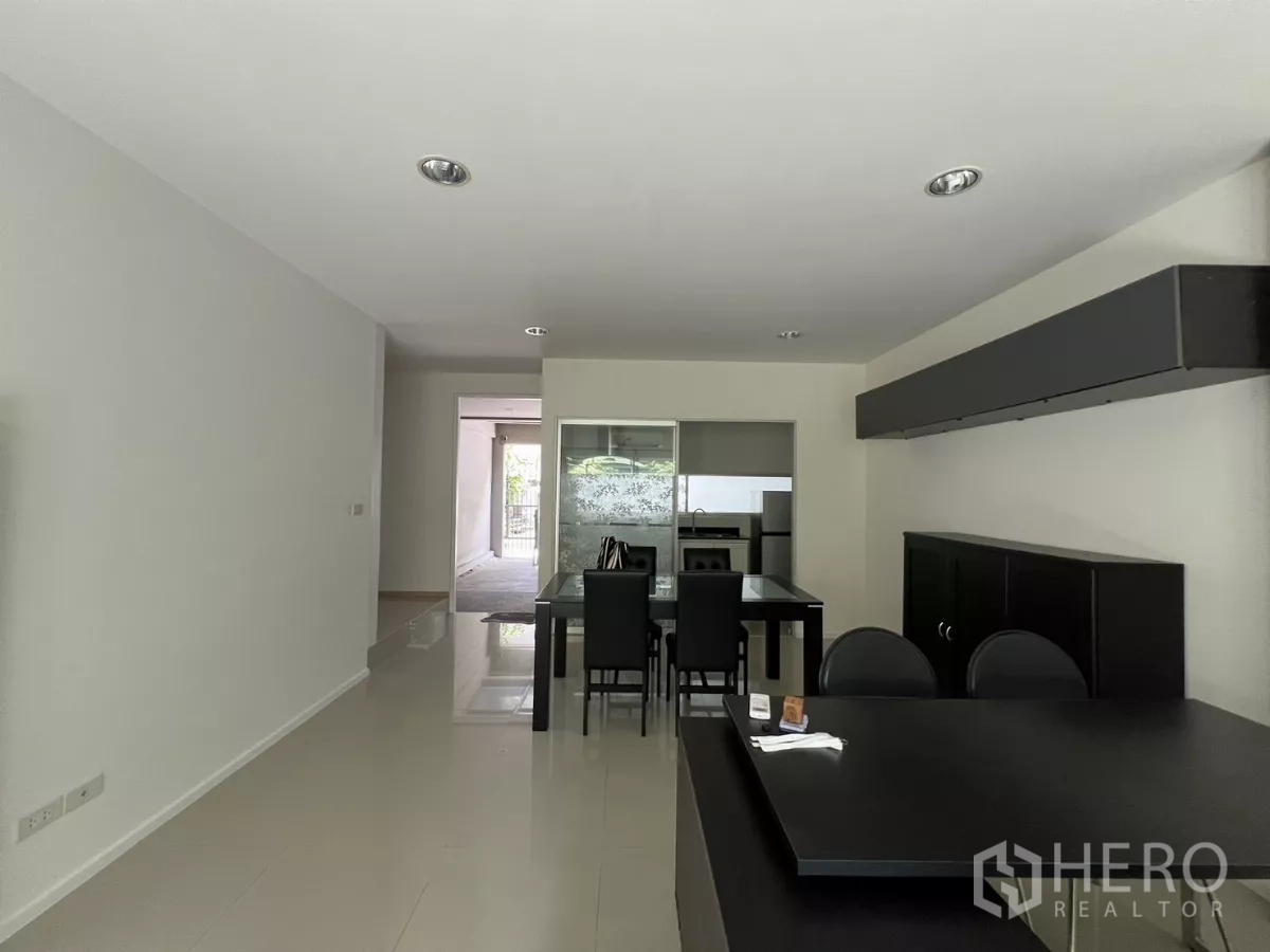 Townhouse for rent in Suan Luang, Bangkok - View from the rear toward the front showing dining space and the kitchen entry.