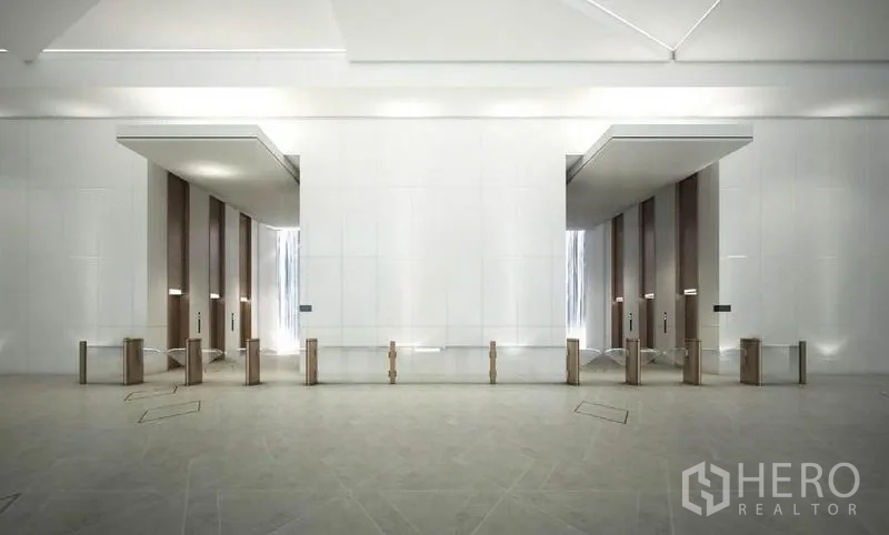 สำนักงาน ให้เช่าในRatchathewi, Bangkok - ล็อบบี้ลิฟต์พร้อมประตูสแกนเข้า-ออก ระบบรักษาความปลอดภัย และเพดานสูง