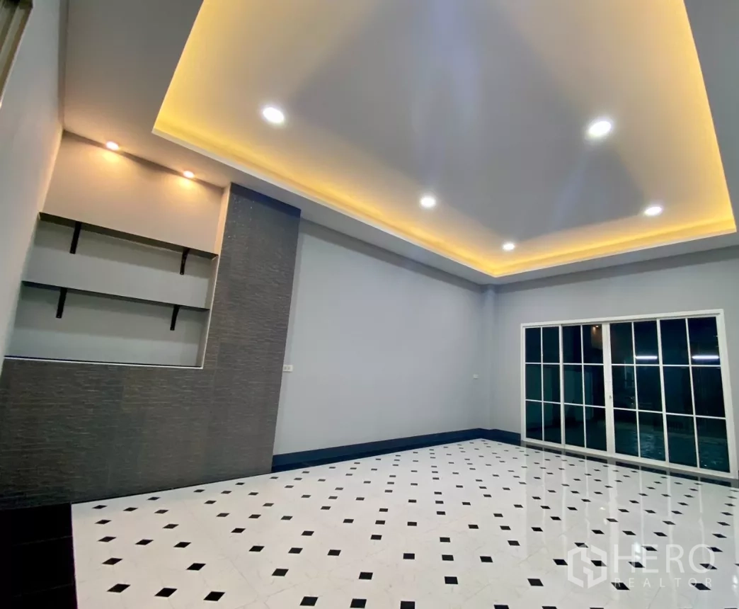 工厂 出租或出售在Bang Bua Thong, Nonthaburi - 开放式房间，特色墙面与大型前向推拉玻璃门。