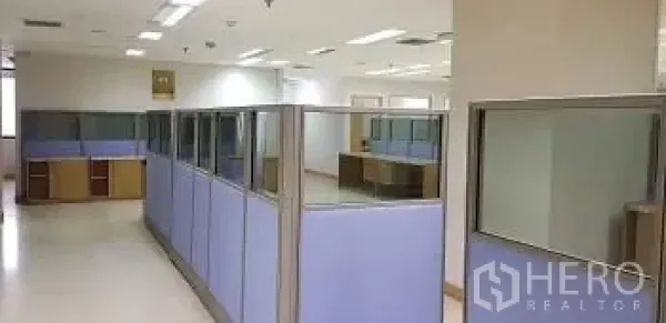 Office Space for rent or sale - Open-plan office with partitioned workstations and ceiling lights in Sathon, Bangkok.
