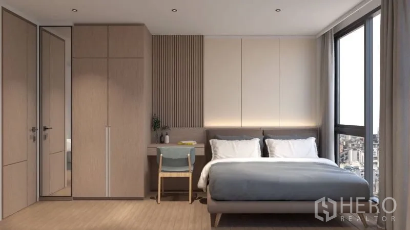 Condominium for rent or sale in Bang Rak, Bangkok - Second bedroom with built-in wardrobe, study nook and corner window with skyline outlook.