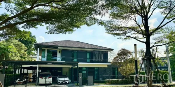 Detached House for rent or sale in Bang Phli, Samut Prakan - Modern two-storey corner detached house with carport and mature trees facing a community garden in Bang Phli.