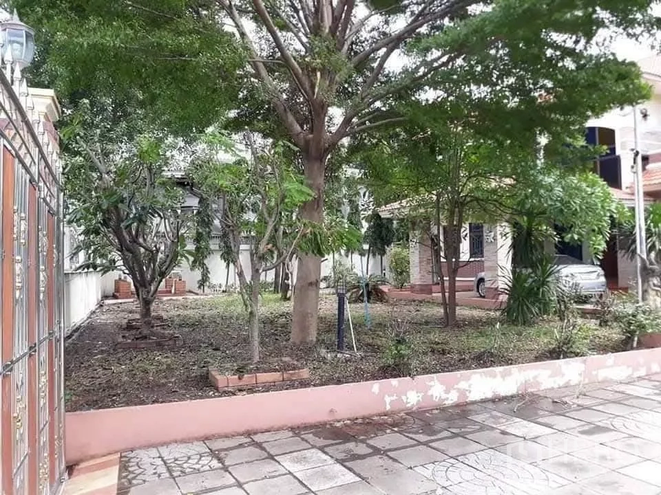 Detached House for sale in Bueng Kum, Bangkok - Large garden with mature shade trees, paved patio and gate.