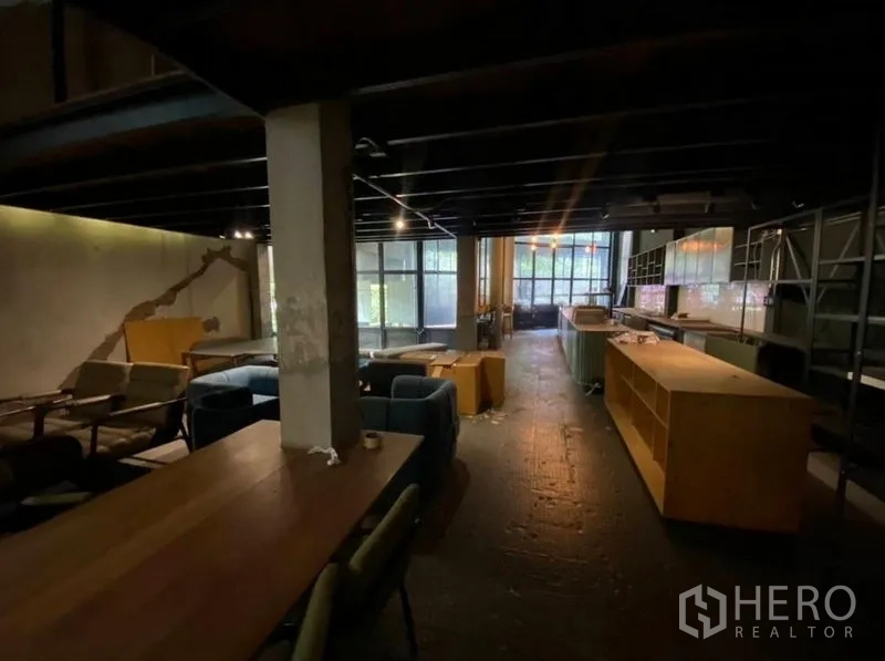 Retail Space for rent in Bang Na, Bangkok - Dim upper level with shelving and service counters