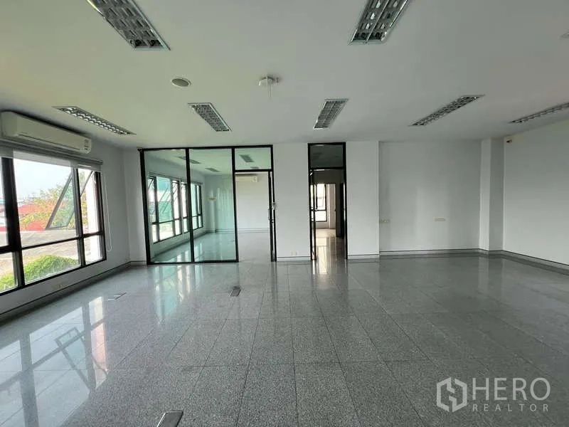 Office Space for sale in Bang Na, Bangkok - Corner office with wraparound windows offering Udom Suk area skyline.