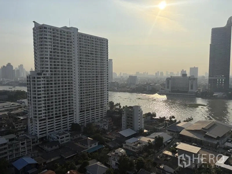 คอนโด for rent in Khlong San, Bangkok - วิวเมืองและแม่น้ำจากชั้นสูงในยามเย็น