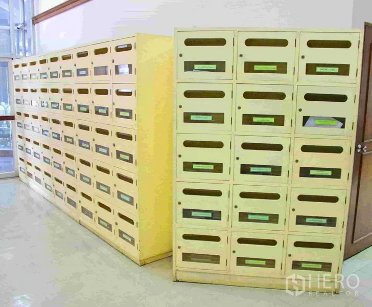 Office Space for rent in Lak Si, Bangkok - Rows of mailboxes and parcel lockers in an office lobby area.