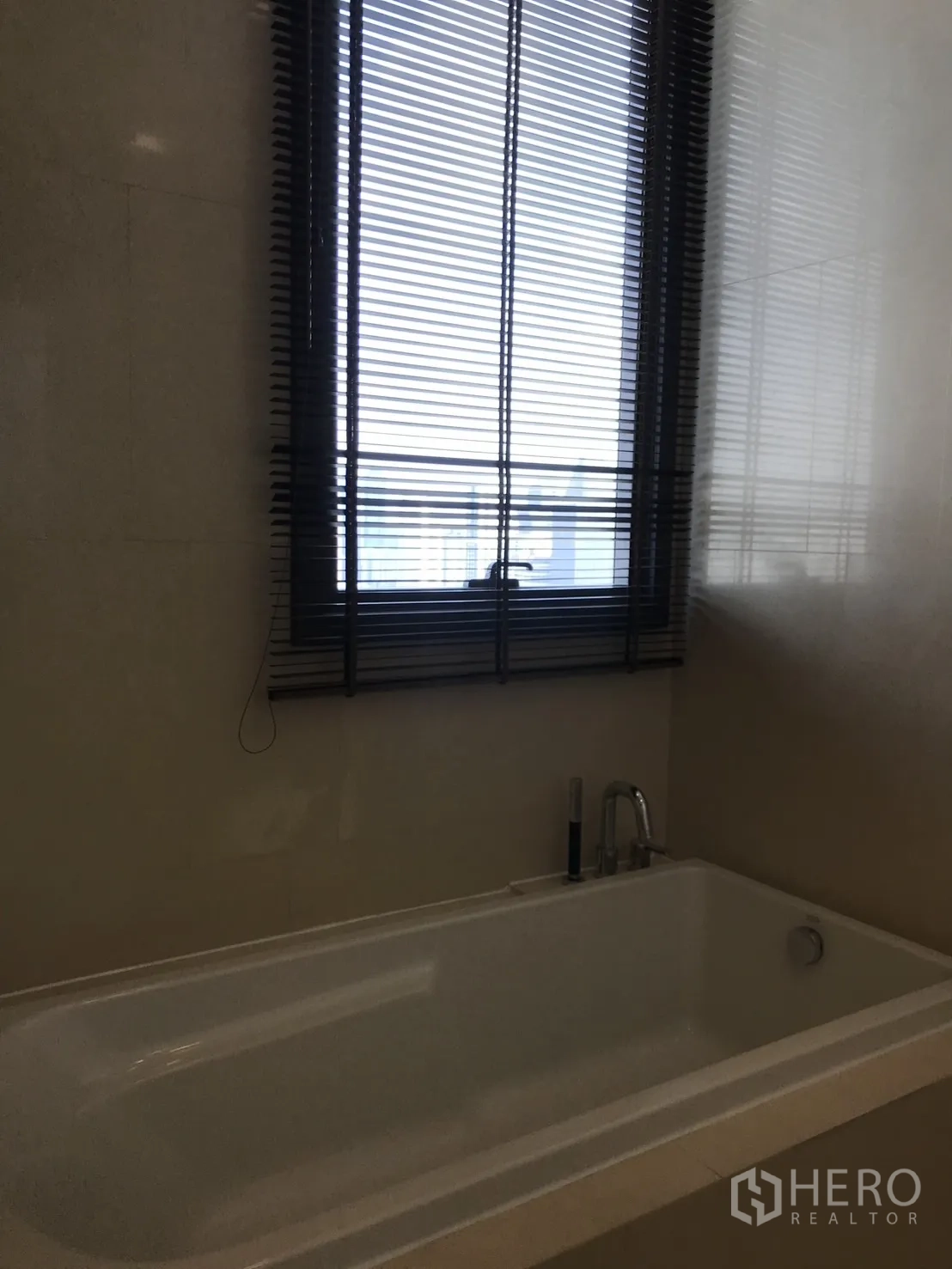 Condominium for rent in Watthana, Bangkok - Separate toilet room with bidet seat and handheld spray.