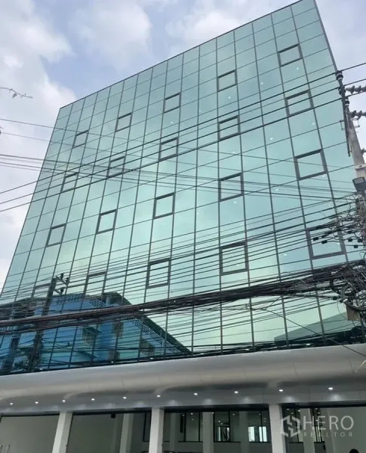 Home Office for rent or sale in Wang Thonglang, Bangkok - Front glass curtain-wall façade of the Bangkok home office.