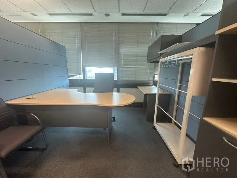 Office Space for rent in Khlong Toei, Bangkok - Furnished manager’s room with built-in storage and large windows with blinds.