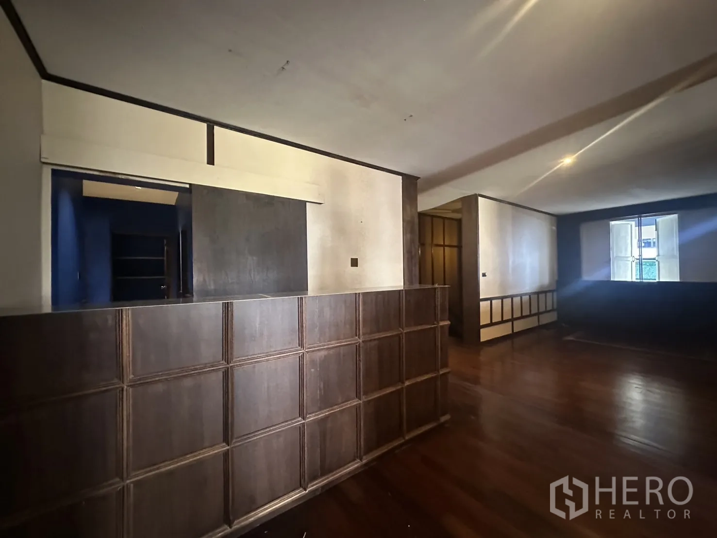 Detached House for rent - Large room with shuttered windows and built-in cabinetry along the wall.
