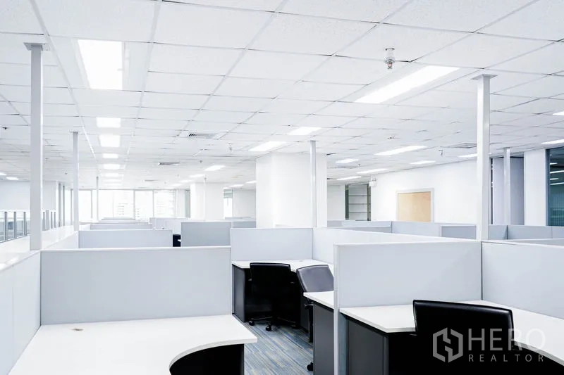 Office Space for rent in Watthana, Bangkok - Expansive cubicle area under recessed lighting in a clean office space.