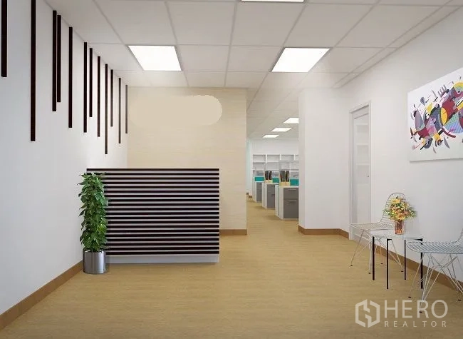 Office Space for rent in Pak Kret, Nonthaburi - Modern reception area with striped front desk, potted plant, and corridor to workstations.