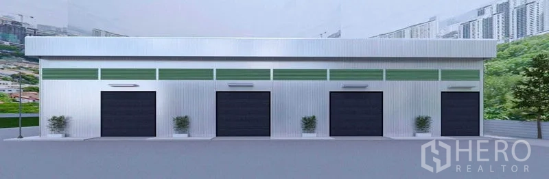 คลังสินค้า ให้เช่าในBang Phli, Samut Prakan - ด้านหน้าตรงของโกดัง มีประตูม้วนสีดำ 4 บาน พร้อมตกแต่งต้นไม้เล็กน้อย