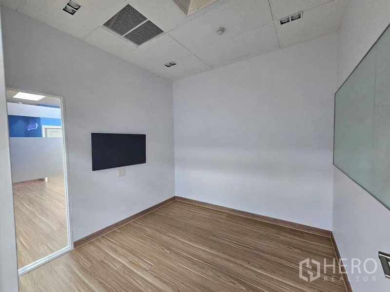 Office Space for rent in Sathon, Bangkok - Small meeting room with mounted display, glass panel and built-in AC.
