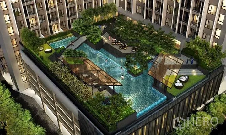 Condominium for rent in Pathum Wan, Bangkok - Rooftop garden with swimming pool, sun decks and landscaped seating areas.