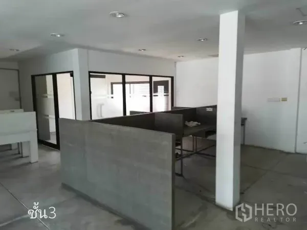 Home Office for rent in Khlong Toei, Bangkok - Open-plan workspace with partitioned desks and glass-enclosed rooms.