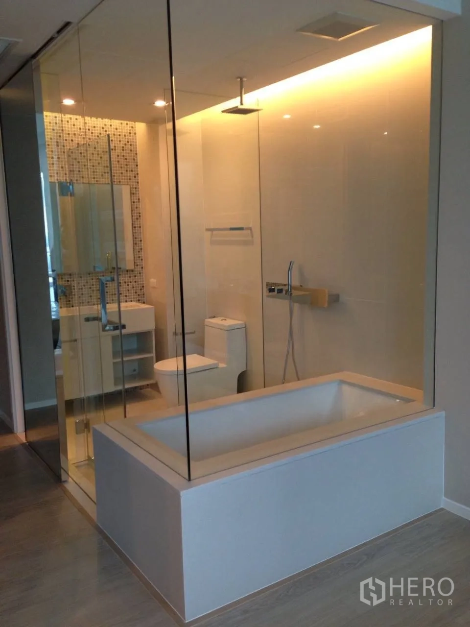Condominium for rent in Watthana, Bangkok - Glass-enclosed bathroom with soaking tub, rain shower and contemporary fittings.