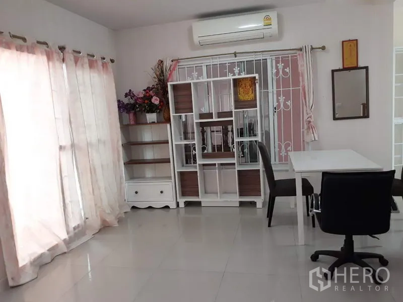 Detached House for rent in Suan Luang, Bangkok - Multi-purpose room featuring shelving unit, air conditioning and large windows