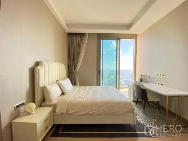 Condominium for rent in Khlong San, Bangkok - Cozy bedroom in neutral tones with balcony access and sweeping city and river views through full-height glazing.