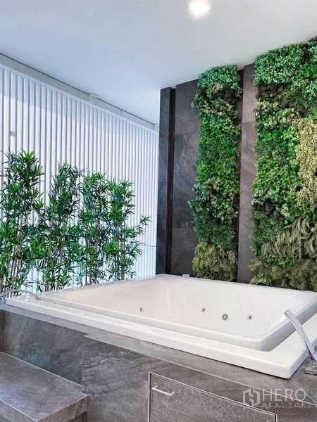 Detached House for rent in Bueng Kum, Bangkok - Private balcony jacuzzi with vertical garden and privacy screens creating a spa-like retreat.