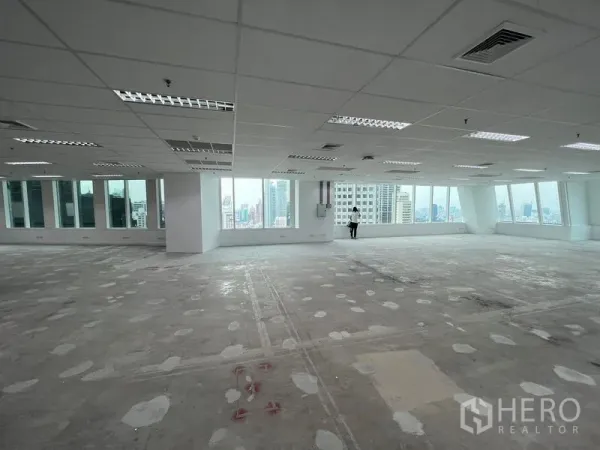 Office Space for rent - Corner office floor showing panoramic windows and skyline outlook across Bangkok.