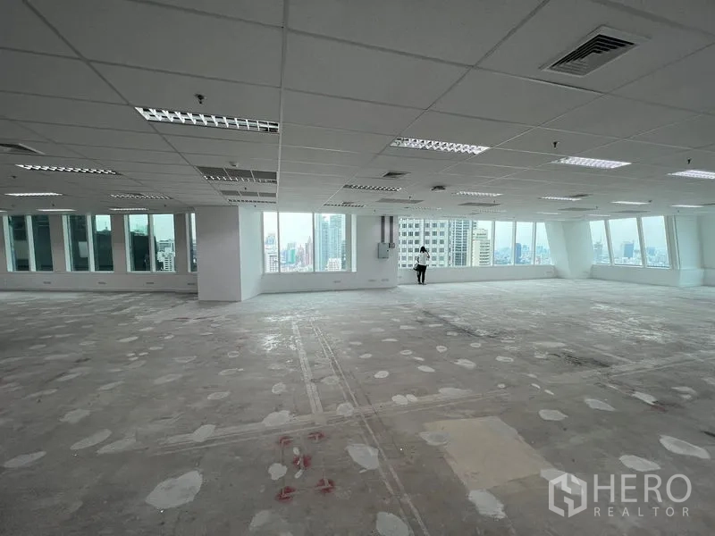 Office Space for rent - Corner office floor showing panoramic windows and skyline outlook across Bangkok.
