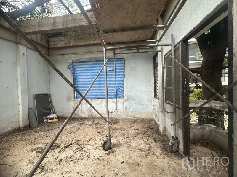 Office Space for rent - Another view of scaffolded room showing open side and tree