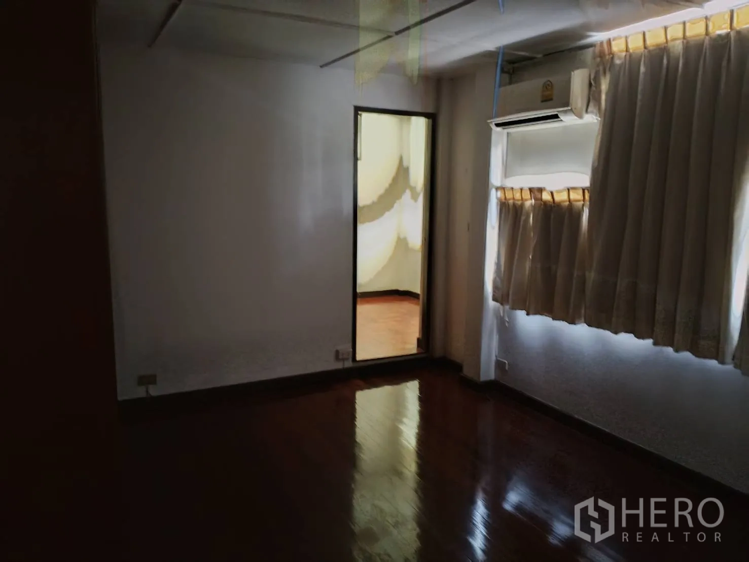 Detached House for sale in Watthana, Bangkok - Room with window and curtains leading to an adjoining space.